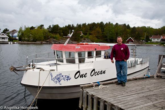 Carlo van duikcentrum One Ocean bij zijn boot